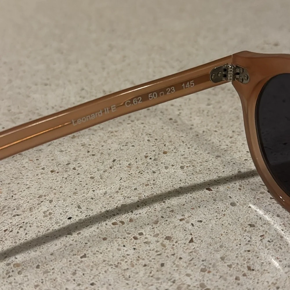 Illesteva Peach Round Sunglasses with Dark Lenses
